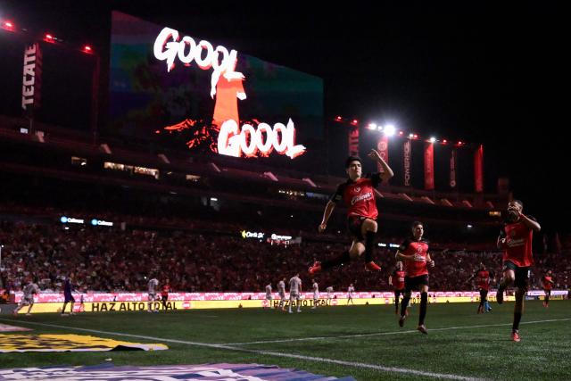 Tijuana's midfielder #10 Gilberto Mora (L) celebrates scoring his team's first goal during the Liga MX Apertura tournament football match between Tijuana and Pumas at the Caliente stadium in Tijuana, Baja California state, Mexico, on August 28, 2026. (Photo by Guillermo Arias / AFP)