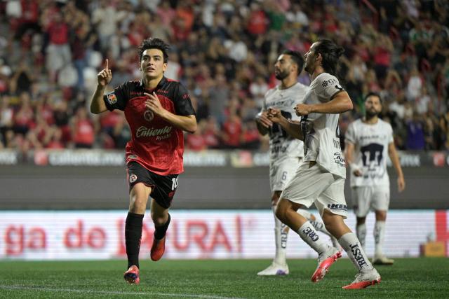 Tijuana's midfielder #10 Gilberto Mora celebrates scoring his team's first goal during the Liga MX Apertura tournament football match between Tijuana and Pumas at the Caliente stadium in Tijuana, Baja California state, Mexico, on August 28, 2026. (Photo by Guillermo Arias / AFP)