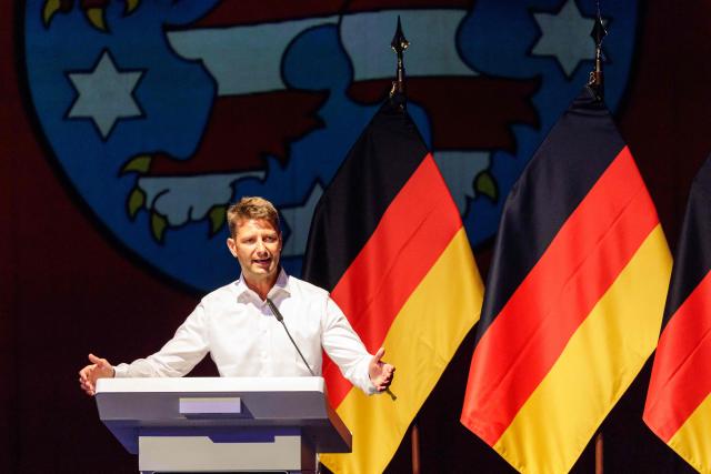 Rene Aust, an AfD member of the European Parliament and head of the party's delegation in the European Parliament, speaks to delegates during the federal congress of Generation Germany, the youth organization of the far-right Alternative for Germany (AfD) party, in Magdeburg, eastern Germany, on August 29, 2026. (Photo by Jens SCHLÜTER / AFP)