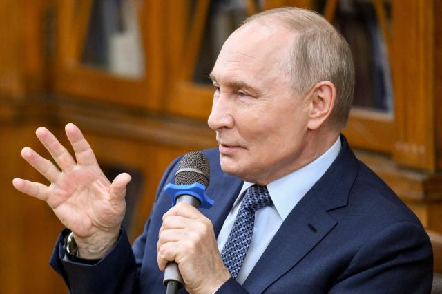 In this pool photograph distributed by the Russian state agency Sputnik, Russia's President Vladimir Putin speaks during a meeting with students of Moscow Pedagogical State University in Moscow on August 29, 2026. (Photo by Vladimir ASTAPKOVICH / POOL / AFP)
