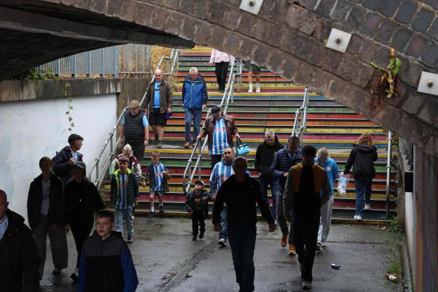 Coventry fans arrive for the English Premier League football match between Coventry City and Hull City at the Coventry Building Society Arena in Coventry, central England on August 29, 2026. (Photo by Darren Staples / AFP)