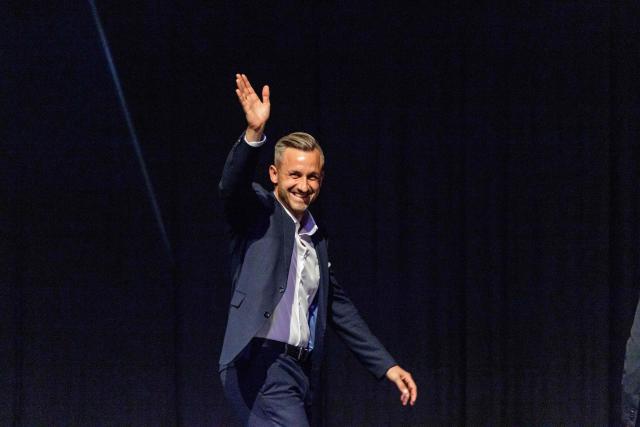 Ulrich Siegmund, far-right Alternative for Germany (AfD)'s main candidate in the Saxony-Anhalt state election, waves as he leaves the stage after addressing delegates during the federal congress of Generation Germany, the youth organization of the far-right Alternative for Germany (AfD) party, in Magdeburg, eastern Germany, on August 29, 2026. (Photo by Jens SCHLÜTER / AFP)