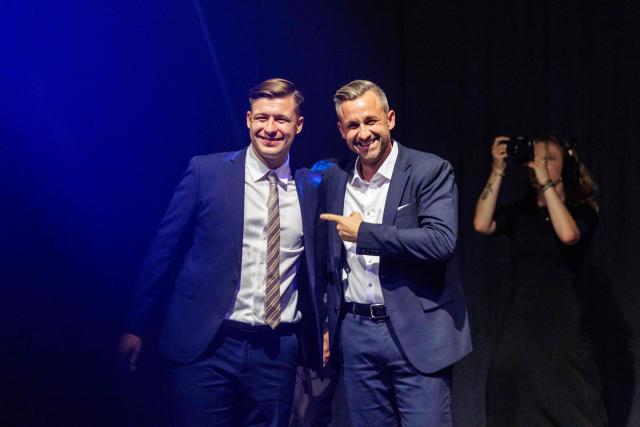 Ulrich Siegmund (R), far-right Alternative for Germany (AfD)'s main candidate in the Saxony-Anhalt state election, and Jean-Pascal Hohm (L), an AfD lawmaker in the Brandenburg state parliament and chairman of Generation Germany, are pictured during the federal congress of Generation Germany, the youth organization of the far-right Alternative for Germany (AfD) party, in Magdeburg, eastern Germany, on August 29, 2026. (Photo by Jens SCHLÜTER / AFP)