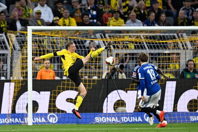 Dortmund's German forward #14 Maximilian Beier misses an attempt to score during the German first division Bundesliga football match between BVB Borussia Dortmund and Hamburg SV in Dortmund, western Germany on August 29, 2026. (Photo by INA FASSBENDER / AFP) / DFL REGULATIONS PROHIBIT ANY USE OF PHOTOGRAPHS AS IMAGE SEQUENCES AND/OR QUASI-VIDEO