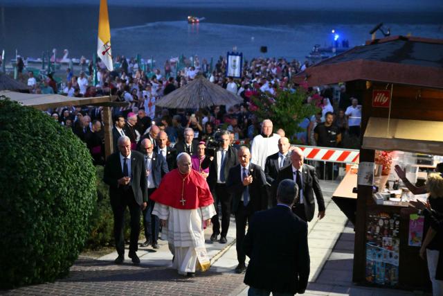 Pope Leo XIV leaves after a boat procession on Lake Albano for the Feast of Our Lady of the Lake in Castel Gandolfo on August 29, 2026. (Photo by Alberto PIZZOLI / AFP)