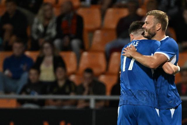 Troyes' French forward #20 Renaud Ripart (R) celebrates with teammates after scoring his team's first goal during the French L1 football match between FC Lorient and ESTAC Troyes at the Stade du Moustoir in Lorient, western France, on August 29, 2026. (Photo by Sebastien Salom-Gomis / AFP)