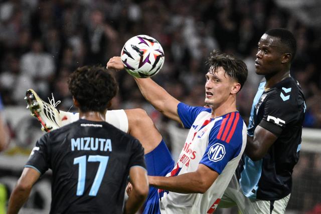 Lyon's Austrian defender #20 Felix Bacher (C) eyes the ball during the French L1 football match between Olympique Lyonnais (OL) and Le Havre AC (HAC) at the Groupama Stadium in Decines-Charpieu, central-eastern France on August 29, 2026. (Photo by ARNAUD FINISTRE / AFP)