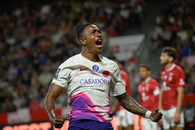 Toulouse's Ivorian defender #12 Christ Tape celebrates after scoring his team's second goal during the French L1 football match between Stade Brestois 29 and Toulouse Football Club at the Francis Le Ble stadium in Brest, western France on August 29, 2026. (Photo by Loic VENANCE / AFP)
