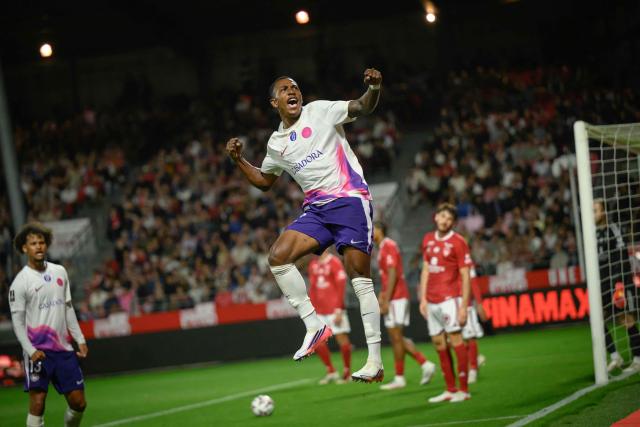 Toulouse's Ivorian defender #12 Christ Tape celebrates after scoring his team's second goal during the French L1 football match between Stade Brestois 29 and Toulouse Football Club at the Francis Le Ble stadium in Brest, western France on August 29, 2026. (Photo by Loic VENANCE / AFP)