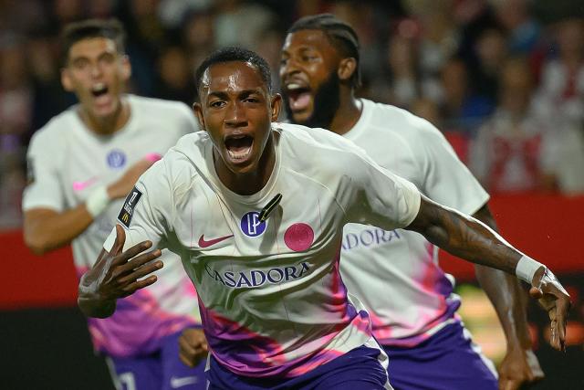 Toulouse's Ivorian defender #12 Christ Tape celebrates after scoring his team's second goal during the French L1 football match between Stade Brestois 29 and Toulouse Football Club at the Francis Le Ble stadium in Brest, western France on August 29, 2026. (Photo by Loic VENANCE / AFP)