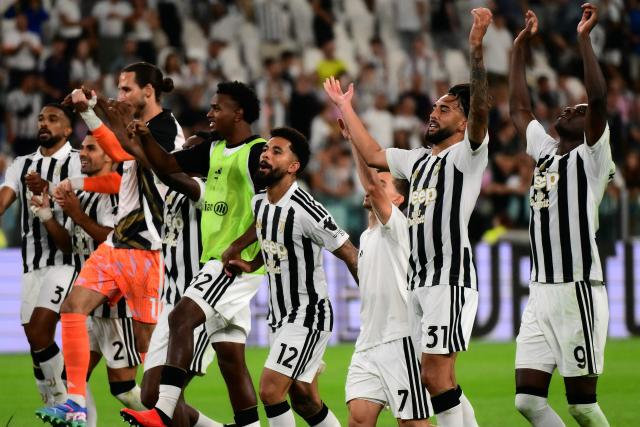 Juventus’ Argentine forward #31 Nico Gonzalez (2R) and teammates celebrate their victory at the end of Italian Serie A football match between Juventus and Parma at the Allianz Stadium in Turin, on August 29, 2026. (Photo by Marco Bertorello / AFP)