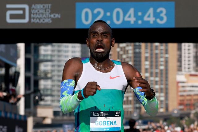 Ethiopia's Addisu Gobena celebrates as he crosses the finish line to win the 2026 Sydney Marathon in Sydney on August 30, 2026. (Photo by DAVID GRAY / AFP)