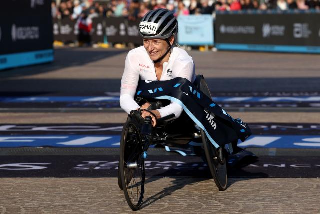 Switzerland’s Manuela Schar reacts as she crosses the finish line to win the Women’s wheelchair category of the 2026 Sydney Marathon in Sydney on August 30, 2026. (Photo by DAVID GRAY / AFP)