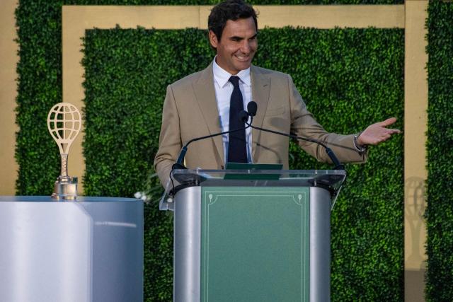 Swiss former tennis player Roger Federer accepts his induction into the International Tennis Hall of Fame during a ceremony in Newport, Rhode Island, on August 29, 2026. (Photo by Joseph Prezioso / AFP)