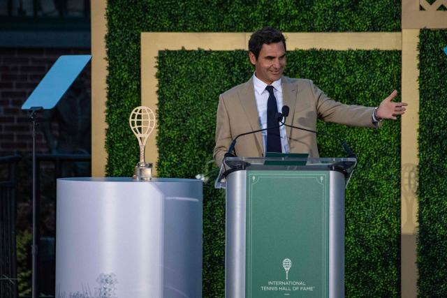 Swiss former tennis player Roger Federer accepts his induction into the International Tennis Hall of Fame during a ceremony in Newport, Rhode Island, on August 29, 2026. (Photo by Joseph Prezioso / AFP)