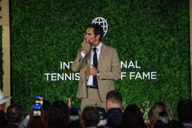 Swiss former tennis player Roger Federer accepts his induction into the International Tennis Hall of Fame during a ceremony in Newport, Rhode Island, on August 29, 2026. (Photo by Joseph Prezioso / AFP)