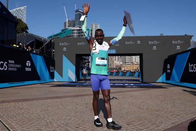 Ethiopia's Addisu Gobena reacts after crossing the finish line to win the 2026 Sydney Marathon in Sydney on August 30, 2026. (Photo by DAVID GRAY / AFP)