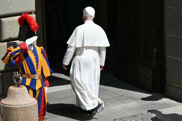 Pope Leo XIV greets leaves after the Angelus prayer from the entrance of the Apostolic Palace in Piazza della Liberta (Liberty Square) at the summer papal residence in Castel Gandolfo on August 30, 2026. (Photo by Alberto PIZZOLI / AFP)