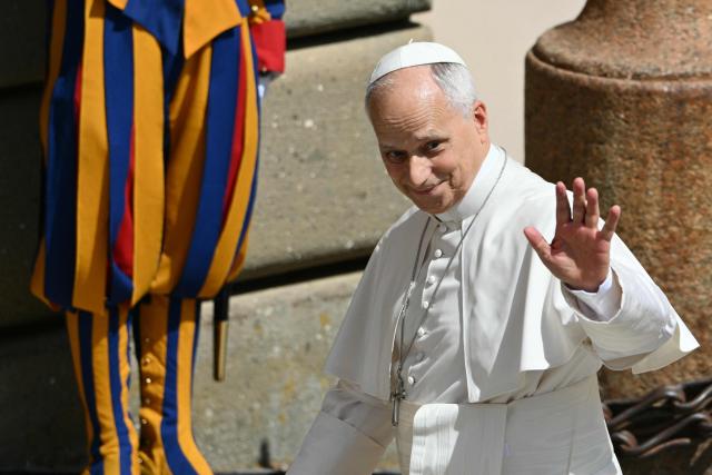 Pope Leo XIV greets the crowd after the Angelus prayer from the entrance of the Apostolic Palace in Piazza della Liberta (Liberty Square) at the summer papal residence in Castel Gandolfo on August 30, 2026. (Photo by Alberto PIZZOLI / AFP)