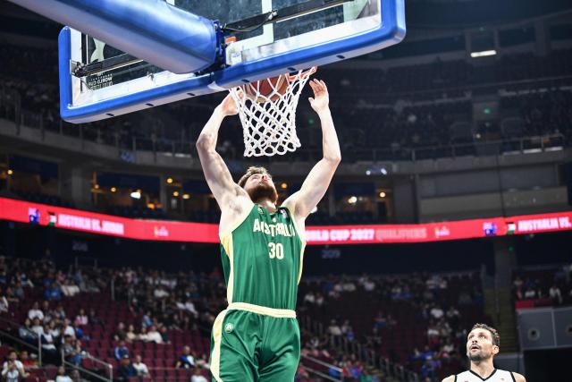 Australia's Anthony Dell'Orso dunks against Jordan during their 2027 FIBA Basketball World Cup Asian qualifier group E match at the Mall of Asia Arena in Pasay city, Metro Manila on August 30, 2026. (Photo by Ted ALJIBE / AFP)