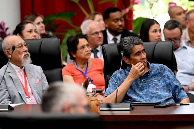 Palau President Surangel S. Whipps Jr. (R) attends the leaders of the Pacific Islands’ Ocean Partnership Roundtable in Koror, Palau, on August 30, 2026, ahead of the 55th Pacific Islands Forum Leaders Meeting. (Photo by SAEED KHAN / AFP)