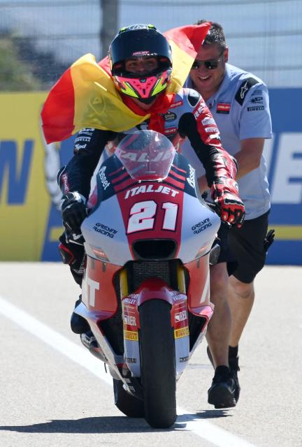 Team QJMOTOR Gresini Moto2's Alonso Lopez celebrates winning the Moto2 race during the Aragon MotoGP Grand Prix at the Motorland circuit in Alcaniz, northeastern Spain, on August 30, 2026. (Photo by JOSE JORDAN / AFP)