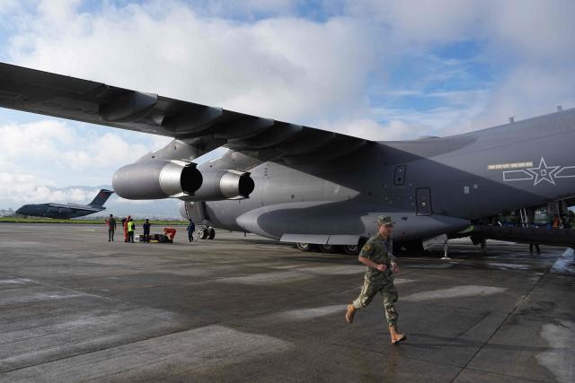 Two Chinese Y-20 transport planes carrying 50 tonnes of emergency relief supplies and four tunnel rescue experts arrive at Tribhuvan International Airport in Kathmandu, Nepal, on August 30, 2026. (Photo by CNS / AFP) / China OUT