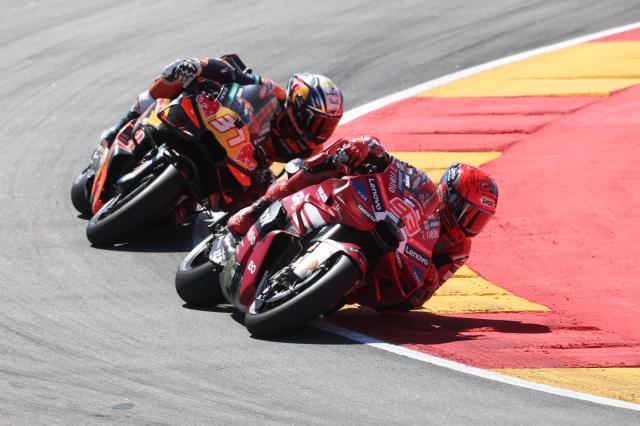 Team Ducati Lenovo Team's Marc Marquez competes against Team Red Bull KTM Factory Racing's Pedro Acosta in the MotoGP race during the Aragon MotoGP Grand Prix at the Motorland circuit in Alcaniz, northeastern Spain, on August 30, 2026. (Photo by Pierre-Philippe MARCOU / AFP)