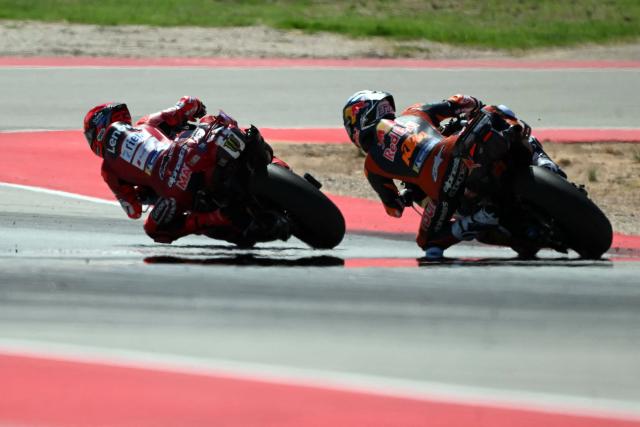 Team Ducati Lenovo Team's Marc Marquez (L) competes against Team Red Bull KTM Factory Racing's Pedro Acosta in the MotoGP race during the Aragon MotoGP Grand Prix at the Motorland circuit in Alcaniz, northeastern Spain, on August 30, 2026. (Photo by JOSE JORDAN / AFP)