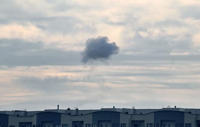 This photograph shows smoke in the sky after Ukrainian air defence fired at Russian drone above Kyiv during a Russian drone strike on the Ukrainian capital on August 30, 2026, amid the Russian invasion of Ukraine. (Photo by Sergei SUPINSKY / AFP)