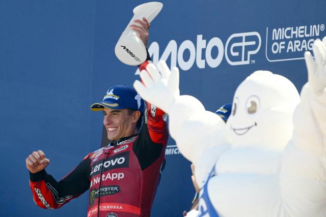 Team Ducati Lenovo Team's Marc Marquez celebrates on the podium after winning the MotoGP race of the Aragon MotoGP Grand Prix at the Motorland circuit in Alcaniz, northeastern Spain, on August 30, 2026. (Photo by JOSE JORDAN / AFP)