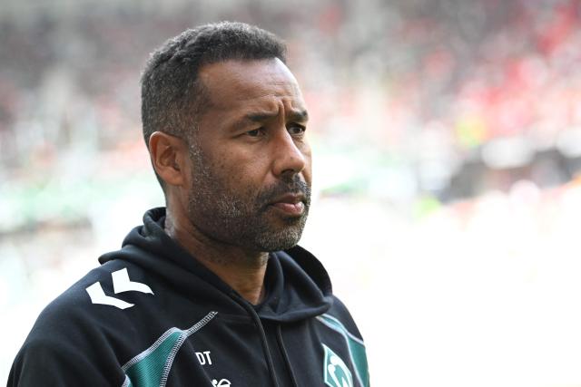 Bremen's German head coach Daniel Thioune walks on the pitch prior to the German first division Bundesliga football match between SC Freiburg and Werder Bremen in Freiburg, southern Germany, on August 30, 2026. (Photo by THOMAS KIENZLE / AFP) / DFL REGULATIONS PROHIBIT ANY USE OF PHOTOGRAPHS AS IMAGE SEQUENCES AND/OR QUASI-VIDEO