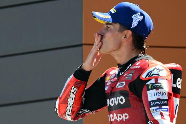 Team Ducati Lenovo Team's Marc Marquez celebrates on the podium after winning the MotoGP race of the Aragon MotoGP Grand Prix at the Motorland circuit in Alcaniz, northeastern Spain, on August 30, 2026. (Photo by JOSE JORDAN / AFP)