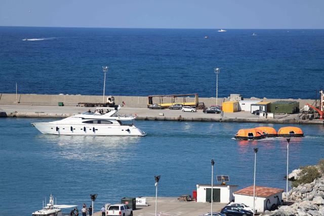 Rescue rafts are towed into the port of Kyrenia in the self-proclaimed Turkish Republic of Northern Cyprus (TRNC), recognised only by Turkey, in the north of the divided Mediterranean island of Cyprus on August 30, 2026, during search and rescue operations following a ferry capsizing. A passenger ferry capsized and sank off Northern Cyprus on August 30, killing at least seven people and leaving 23 missing, officials said, as a rescue operation was under way. The cause was not yet established. The vessel capsized 6.5 kilometres (four miles) off the coast of Cyprus, shortly after it had left a Northern Cyprus port heading to Turkey's mainland. (Photo by Birol BEBEK / AFP)