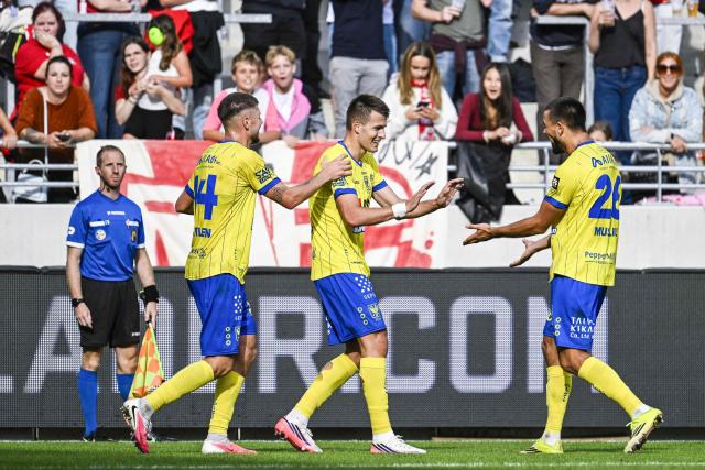 STVV's Serbian forward #9 Samed Bazdar (C) celebrates scoring his team's second goal during the Belgian "Pro League" First Division football match between Antwerp and Sint-Truidense VV (STVV) at Bosuilstadion in Antwerp on August 30, 2026. (Photo by Tom Goyvaerts / BELGA / AFP) / Belgium OUT