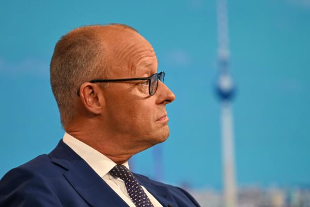 German Chancellor Friedrich Merz takes his seat at the TV studio prior to his annual summer interview with public broadcaster ARD in Berlin on August 30, 2026. (Photo by RALF HIRSCHBERGER / AFP)