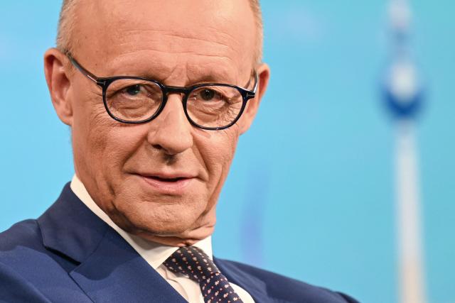 German Chancellor Friedrich Merz takes his seat at the TV studio prior to his annual summer interview with public broadcaster ARD in Berlin on August 30, 2026. (Photo by RALF HIRSCHBERGER / AFP)