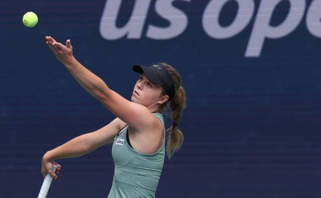Slovenia’s Veronika Erjavec serves to Italy’s Jasmine Paolini during their women’s singles first-round match on the opening day of the US Open tennis tournament at the USTA Billie Jean King National Tennis Center in New York City on August 30, 2026. (Photo by TIMOTHY A. CLARY / AFP)