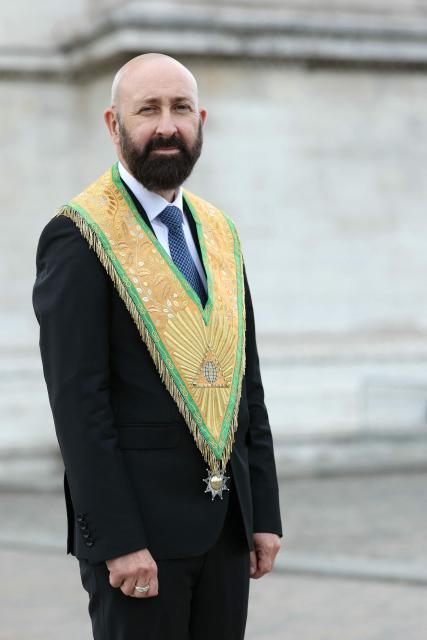 Newly elected Grand Master of the Freemasonic organization The Grand Orient de France (GODF) Guillaume Trichard poses for a picture prior to pay his respects on the tomb of the Unknown Soldier under the Arc de Triomphe Monument in Paris on August 30, 2026. (Photo by Thomas SAMSON / AFP)