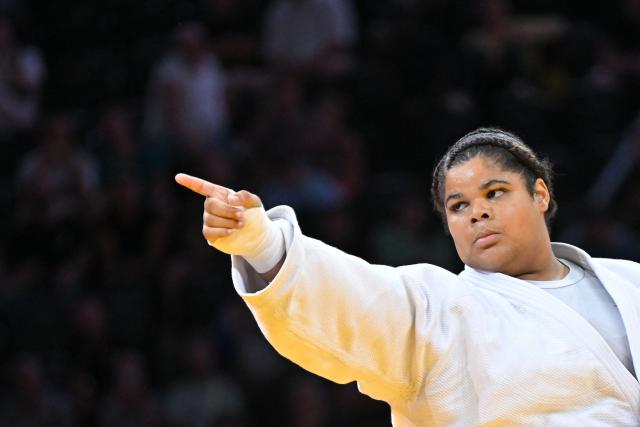 France's Lea Fontaine celebrates her victory in the women's above 78kg gold medal bout at the Lausanne Grand Slam judo tournament, part of the IJF World Judo Tour, in Prilly on August 30, 2026. (Photo by Fabrice Coffrini / AFP)