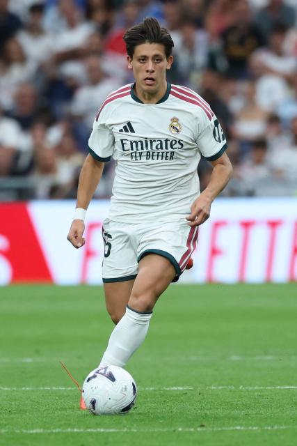 Real Madrid's Turkish midfielder #15 Arda Guler controls the ball during the Spanish league football match between Real Madrid CF and Malaga CF at Santiago Bernabeu Stadium in Madrid on August 30, 2026. (Photo by Thomas COEX / AFP)