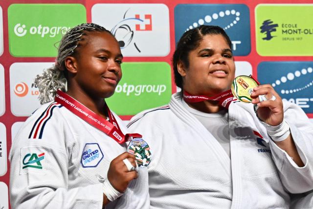 Gold medallist France's Lea Fontaine (white) and silver medallist France's Romane Dicko pose during the podium ceremony of the women's above 78kg category event at the Lausanne Grand Slam judo tournament, part of the IJF World Judo Tour, in Prilly on August 30, 2026. (Photo by Fabrice Coffrini / AFP)