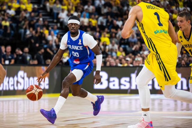 France's point guard #00 Sylvain Francisco runs with the ball during the FIBA 2027 World Cup qualifying basketball match, 2nd round Group L, between Sweden and France at Avicii Arena in Stockholm, on August 30, 2026. (Photo by Jonathan NACKSTRAND / AFP)