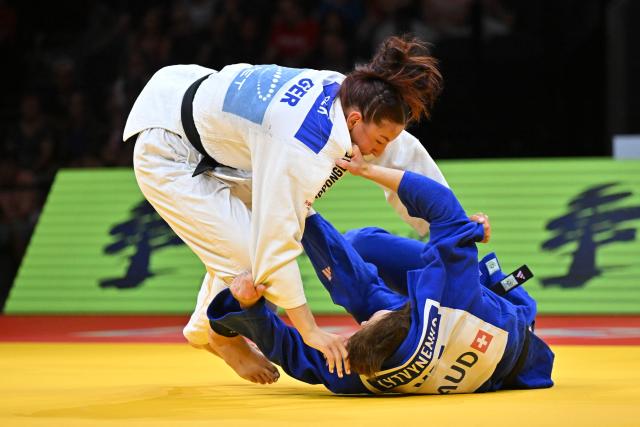 Germany's Anna Monta Olek (white) and United Arab Emirates' Yelyzaveta Lytvynenko compete in the women's under 78kg gold medal bout at the Lausanne Grand Slam judo tournament, part of the IJF World Judo Tour, in Prilly on August 30, 2026. (Photo by Fabrice COFFRINI / AFP)