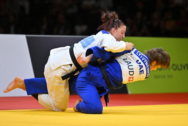 Germany's Anna Monta Olek (white) and United Arab Emirates' Yelyzaveta Lytvynenko compete in the women's under 78kg gold medal bout at the Lausanne Grand Slam judo tournament, part of the IJF World Judo Tour, in Prilly on August 30, 2026. (Photo by Fabrice COFFRINI / AFP)