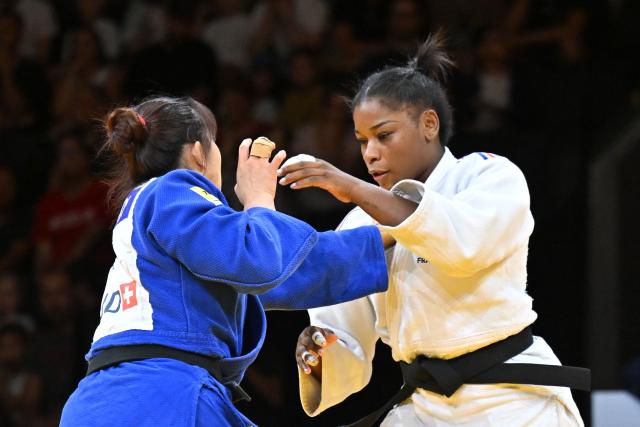 France's Kaila Issoufi (white) and Japan's Kurena Ikeda compete in the women's under 78kg bronze medal bout at the Lausanne Grand Slam judo tournament, part of the IJF World Judo Tour, in Prilly on August 30, 2026. (Photo by Fabrice COFFRINI / AFP)