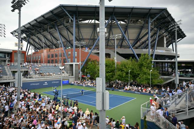 eneral view of Arthur Ashe Stadium (back) on day one of the US Open tennis tournament at the USTA Billie Jean King National Tennis Center in New York City on August 30, 2026. (Photo by ANGELA WEISS / AFP)