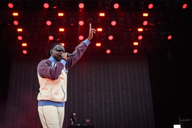 French rapper, singer and footballer Guy Kapata, known as Guy2Bezbar, performs at the Goldencoast Rap Festival in Corcelles-les-Monts, near Dijon, central-eastern France, on August 30, 2026. (Photo by ARNAUD FINISTRE / AFP)