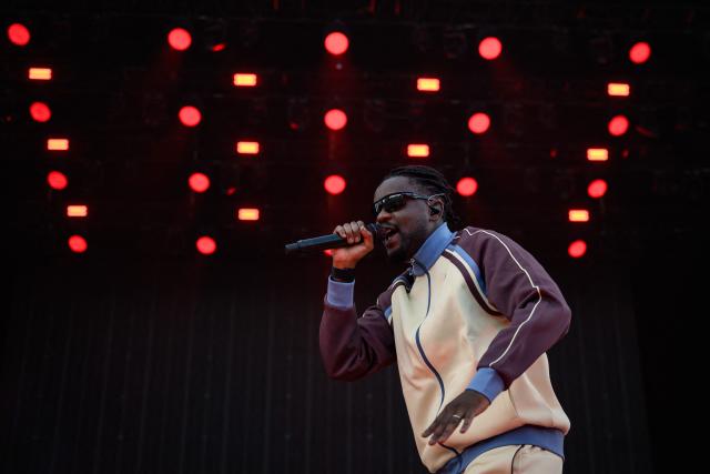 French rapper, singer and footballer Guy Kapata, known as Guy2Bezbar, performs at the Goldencoast Rap Festival in Corcelles-les-Monts, near Dijon, central-eastern France, on August 30, 2026. (Photo by ARNAUD FINISTRE / AFP)