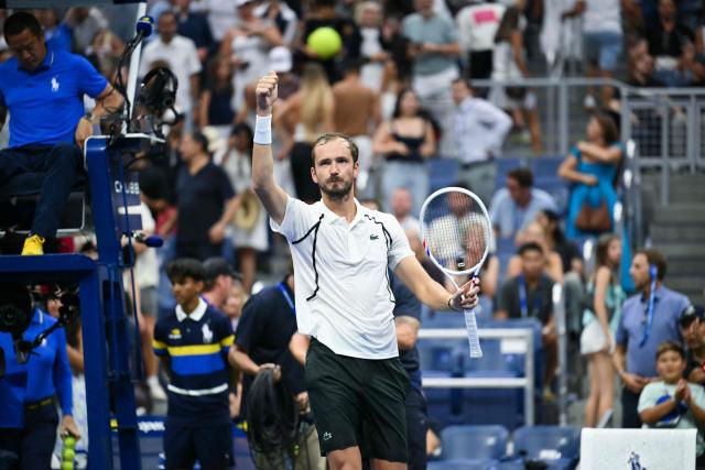 Russia's Daniil Medvedev celebrates defeating France's Hugo Gaston in their men's singles first round tennis match on day one of the US Open tennis tournament at the USTA Billie Jean King National Tennis Center in New York on August 30, 2026. (Photo by ANGELA WEISS / AFP)